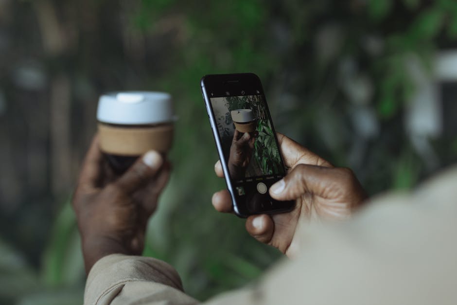 Illustration of a person using an iPhone and troubleshooting it.